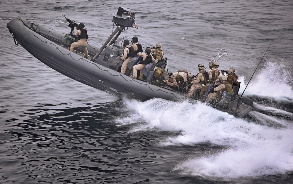 Special forces team in a rigid inflatable boat at speed